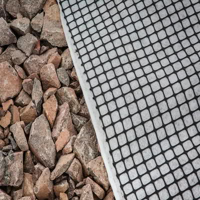 	Warp-knitted composite geotextiles for railway roadbed reinforcement